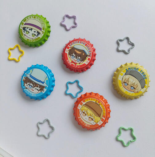 DCMK bottle caps pin